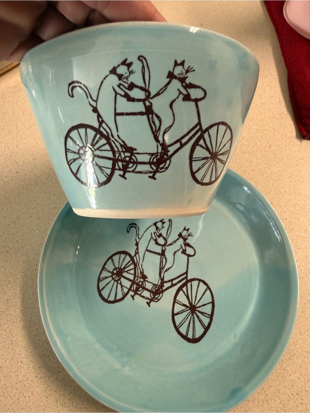 Cats riding a tandem bicycle bowl and plate By Fehrenbacher